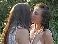 Lesbian love outdoors from two sexy and hot college girls