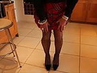 Sindy in black top with red kilt