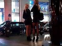 Two Blonde in miniskirt pantyhose and high heels