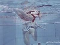 Roxalana Chech in scuba diving in the pool