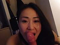 beautiful asian gives blowjob