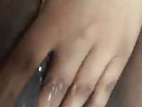 Ebony fingering herself