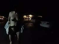 walking blindfolded through the parking lot naked