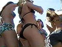 Spring break chick in black bikini dancing ass in camera