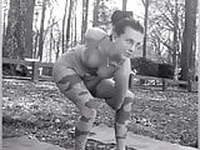 flexible girl stretching outdoors