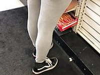 Latina in gray leggings 