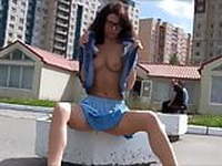 Russian girl posing nude in the city streets