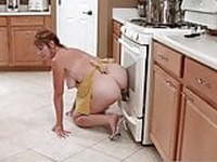 Mother fucks mounted dildo in the kitchen. Milf Dildo